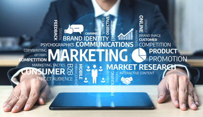 Fototapeta premium A business professional focuses on effective marketing strategies using a tablet, surrounded by digital concepts that illustrate the importance of market analysis and consumer engagement. Tessel