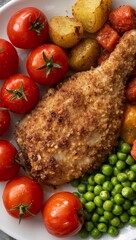 Close Up of Crispy Breaded Chicken Breast Served with Cherry Tomatoes, Green Peas and Roasted Potatoes