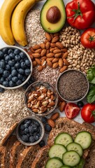 Healthy breakfast and snack ingredients flat lay featuring avocado, bananas, blueberries, almonds, oats, and fresh vegetables for a balanced organic diet and wellness lifestyle.