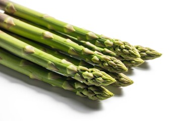 Fresh green asparagus spears isolated on white background
