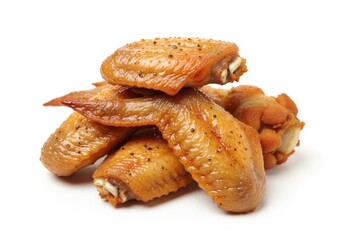 Pile of delicious cooked chicken wings isolated on white background
