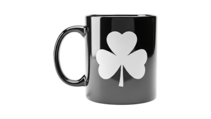 Black coffee mug with white shamrock design on side isolated on transparent background