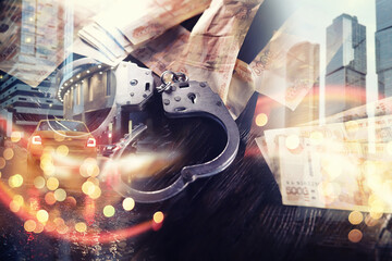 Double exposure of male hands locked in handcuffs city landscape background. Hands in handcuffs...