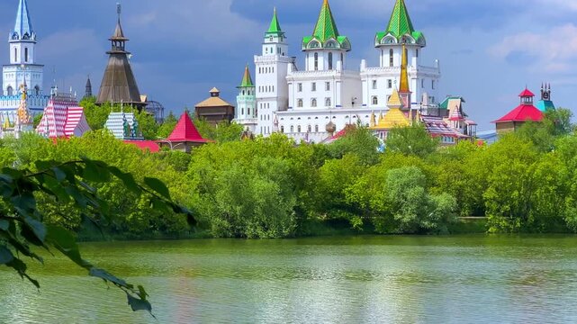 Russian traditional architecture, the Kremlin in Izmailovo, on the shore of a pond, Moscow. The architectural ensemble is stylized under Russian architecture of the 16-17 centuries. Gingerbread houses