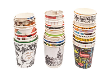 stacked disposable cups with stains showcasing casual and used appearance perfect for illustrating waste or coffee culture