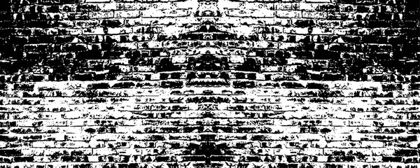 Obraz premium a stark black and white brick wall with a rough texture, creating a high contrast and abstract background