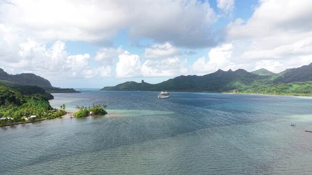 Drone Shot of Cruise Ship in Bay of Huahine Island, French Polynesia, Coastline and Tropical Lush