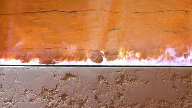 Working water vapor fireplace built into the stone surface