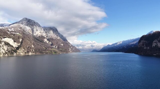 aerial view of walensee glacial waters enclosed by alpine mountains switzerland