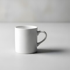 Obraz premium Simple white coffee mug on a table