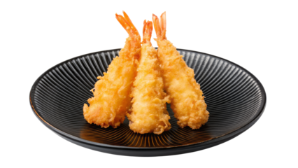 Tempura shrimp on a black ribbed plate with a white background