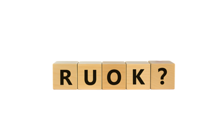 Wooden letter tiles spelling ruok with a question mark on transparent background.