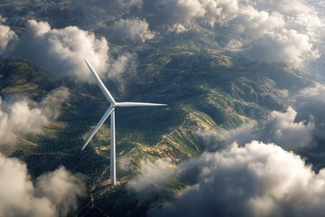 Wind turbine overlooking lush hills and cloudy skies providing renewable energy in an aerial view during daylight