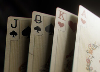 Vintage Royal Playing Cards Closeup Dark Background