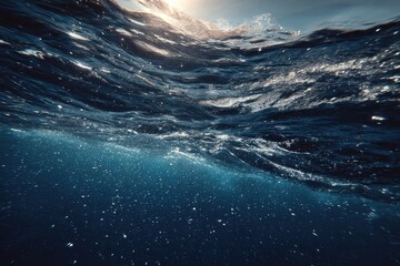 Fototapeta premium Underwater view of shimmering waves and bright sea surface during a quiet afternoon