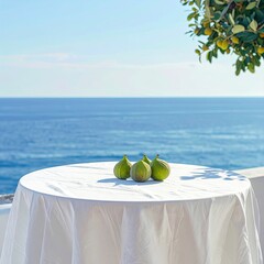 Fresh figs on a white table overlooking the ocean