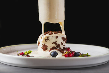 Elegant tiramisu style dessert with cocoa and layered cream