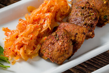 Traditional Edirne fried liver served with onions and spices