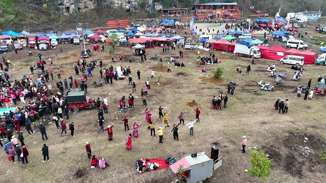 Traditional Ethnic Festival with Sea of People, Showcasing Local Customs and Joy