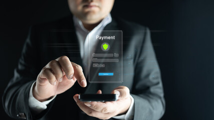 Businessman using smartphone with secure payment interface, symbolizing online banking, financial transaction, digital wallet, cybersecurity, secure checkout, and safe online payment system.