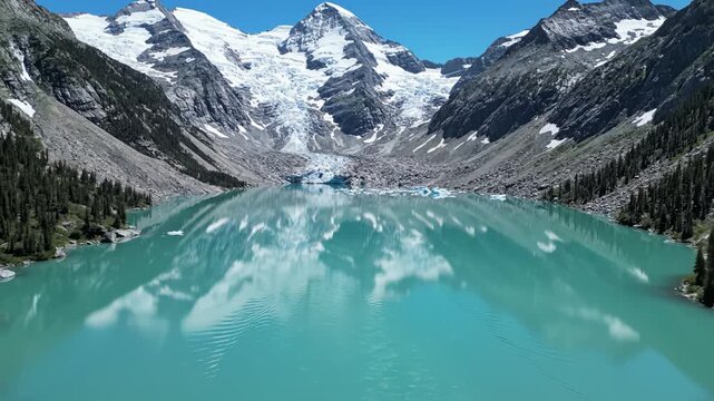 Mountain lake with glacier in valley