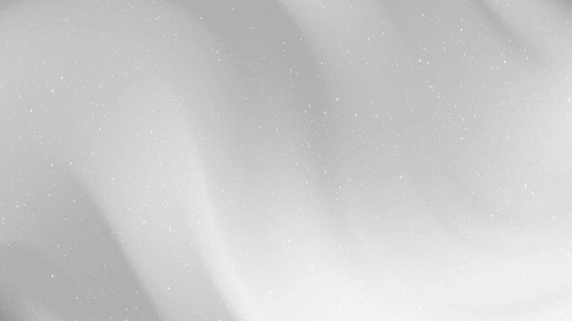 Winter snowy sparkles abstract gray background for winter themed designs, holiday greeting cards, festive social media posts, and seasonal advertisements