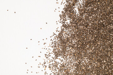 Chia seeds macro, texture. Food background, healthy eating concept, superfood. Dry organic chia seeds rich in omega-3, protein, vitamins and minerals. Chia seeds close up