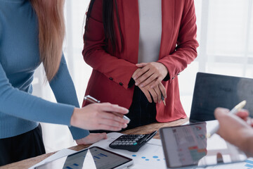 Business women discussing financial data during office meeting
