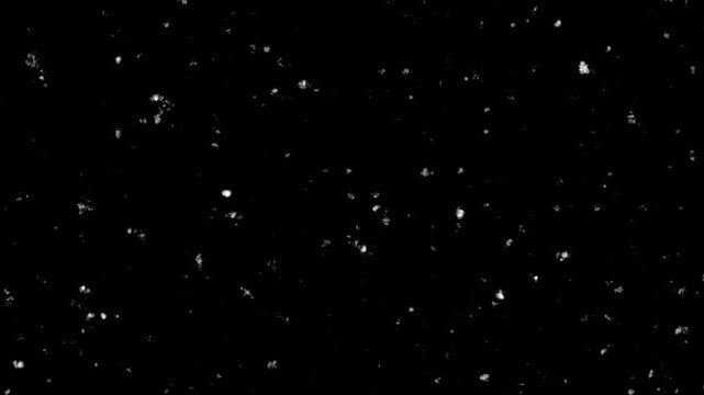 Vintage damaged film texture with dust, hair, and scratch marks on black background for old movie or retro video overlay effect. 4K video
