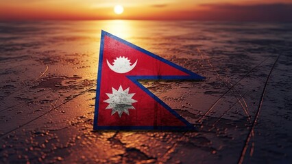 The Nepalese flag with a sunrise backdrop, resting on a textured, reflective surface