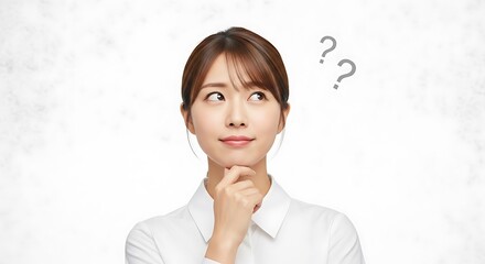 Young Asian woman pondering with question marks above her head.