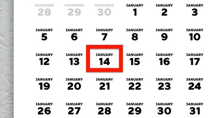 Close-up of the date January 14th marked with a red cursor on the wall calendar 2026