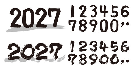筆で書いた0から9までの数字のひと揃い。