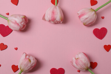 Valentine's Day banner with gift boxes surrounded by red hearts on a pink background. Perfect for romantic and festive events.
