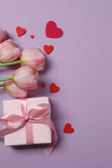 Valentine's Day banner with gift boxes surrounded by red hearts on a colorful background. Perfect for romantic and festive events.
