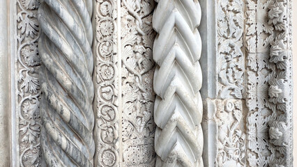 Naklejka premium Ornate italian romanesque marble carving with twisted column details