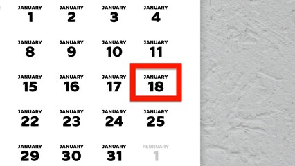 Close-up of the date January 18th marked with a red cursor on the wall calendar 2026