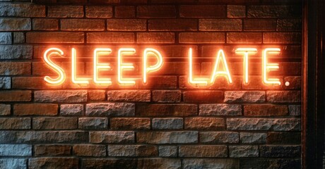 Bright neon sign displays Sleep Late. against textured brick wall. Dark background emphasizes glowing letters, creating warm ambiance.