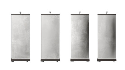 Four blank retractable banner stands on a black background