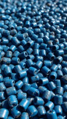 Fototapeta premium Macro View of Rough Blue Recycled Plastic Pellets