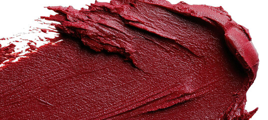 Textured deep red lipstick smear on black background, close-up