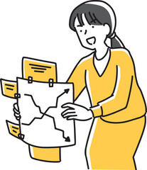 つぎはぎされた企画書を見せる女性社員