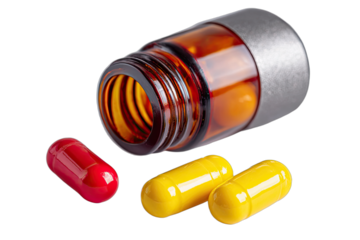Amber bottle with two capsules and one red capsule on a black background