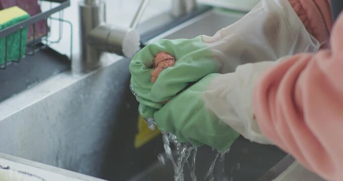 Clean your range hood, wipe the stove, and wash the dishcloth.