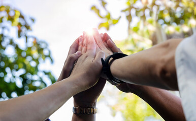 Teamwork Concept,Group of diversity people to greeting power tag team,Teamwork Join Hands Partnership Concept	