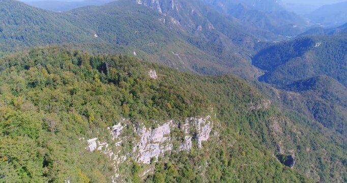 Aerial view of forested mountain valley, Slovenia