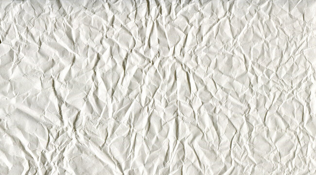 Vintage grunge white paper texture with heavy wrinkles and creases. Aged crumpled paper background for retro design, distressed layouts, posters, collage, stationery and copy space.
