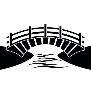 Black and White Silhouette of an Arch Bridge Over Water.