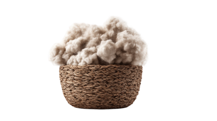 Light beige fluffy material in a woven basket