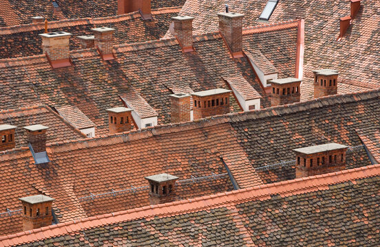 Historic tiled rooftops and chimneys in Graz old town Austria